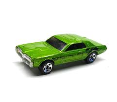 Color Green 1968 Cougar Hotwheels -- Made in malaysia -- Has a scale of 1/64 in kenya